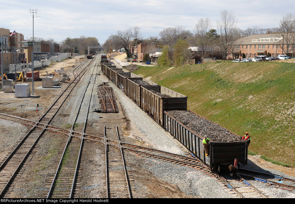 Train E60 is backing its track towards Glenwood Yard using the newly installed track